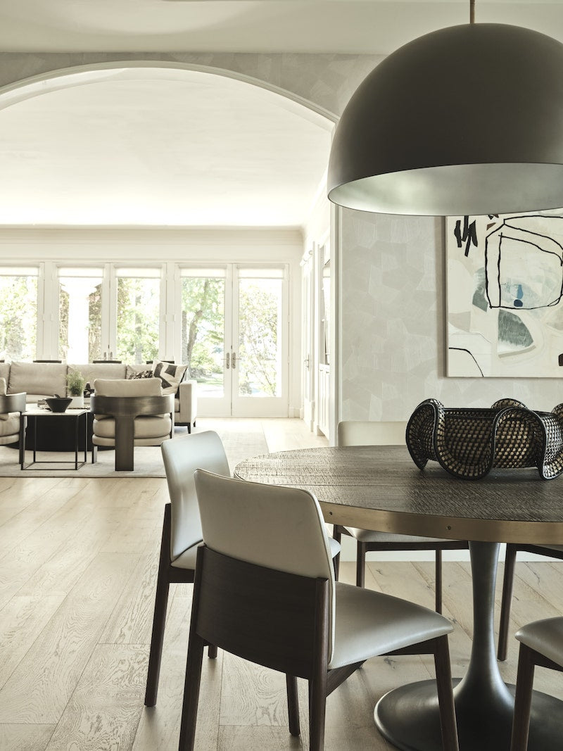 Large Living Space With Beige Wooden Floors And Light Gray Walls