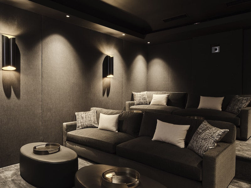 Gray Coaches in A Movie Theater Room