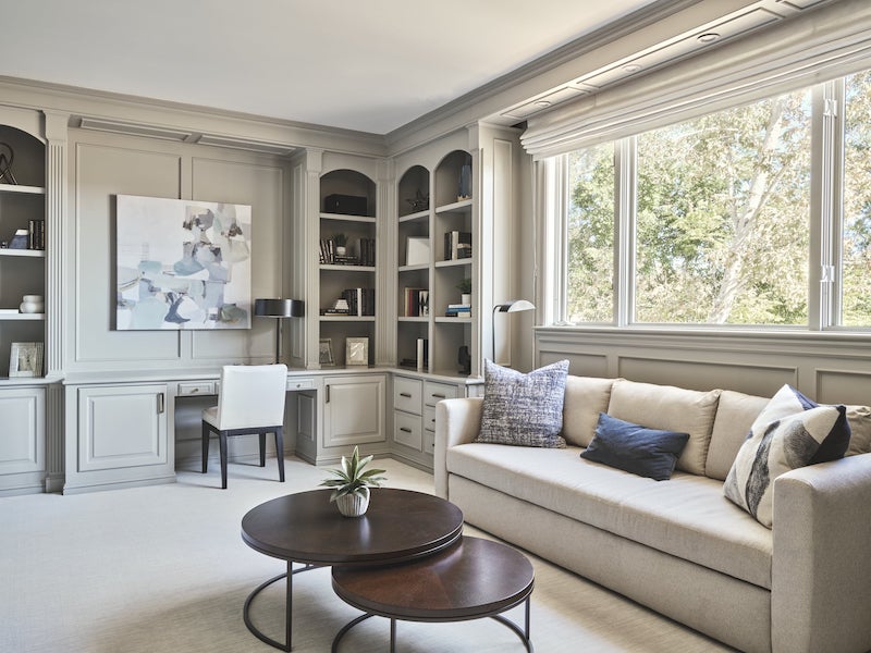 Light Gray Coach And A Dark Wooden Coffee Table