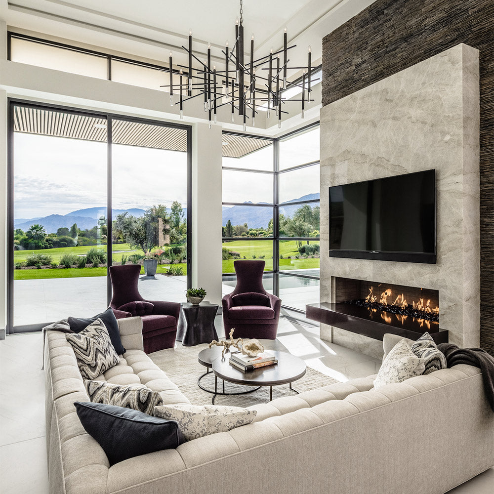 Wide Living Room And A TV Above The Fireplace