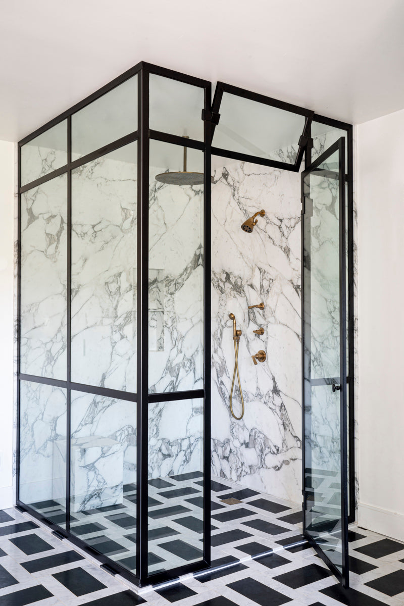 Show And Black And White Tiles In The Bathroom