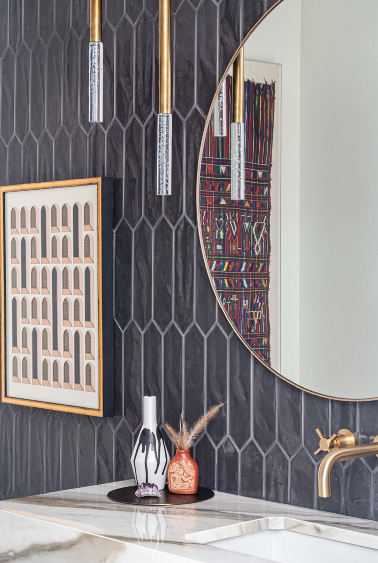 Dark Grey Tiles And A Beige Marble Sink