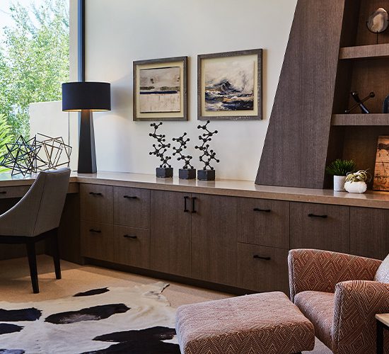 Black Modern Statuettes In A Dark Wood Accent Room