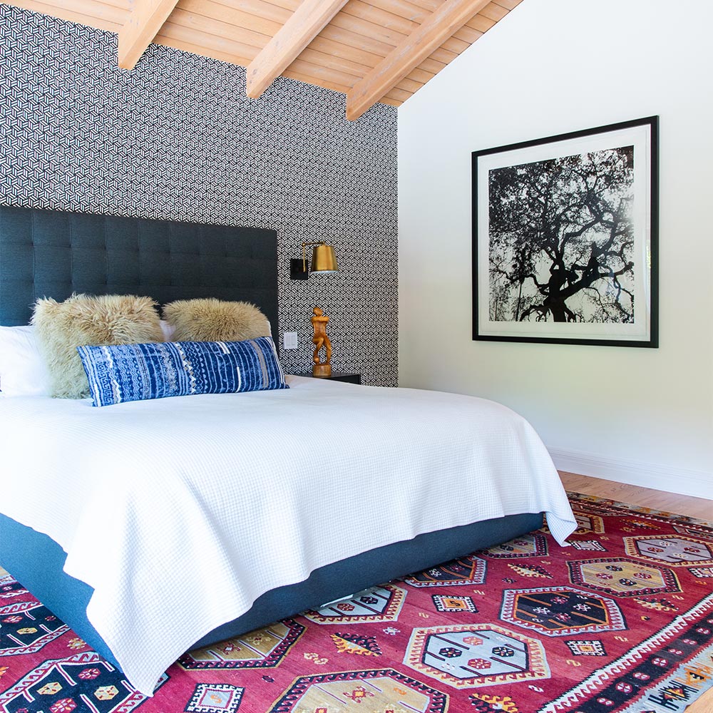 Bedroom With A Detailed Black And White Wallpaper