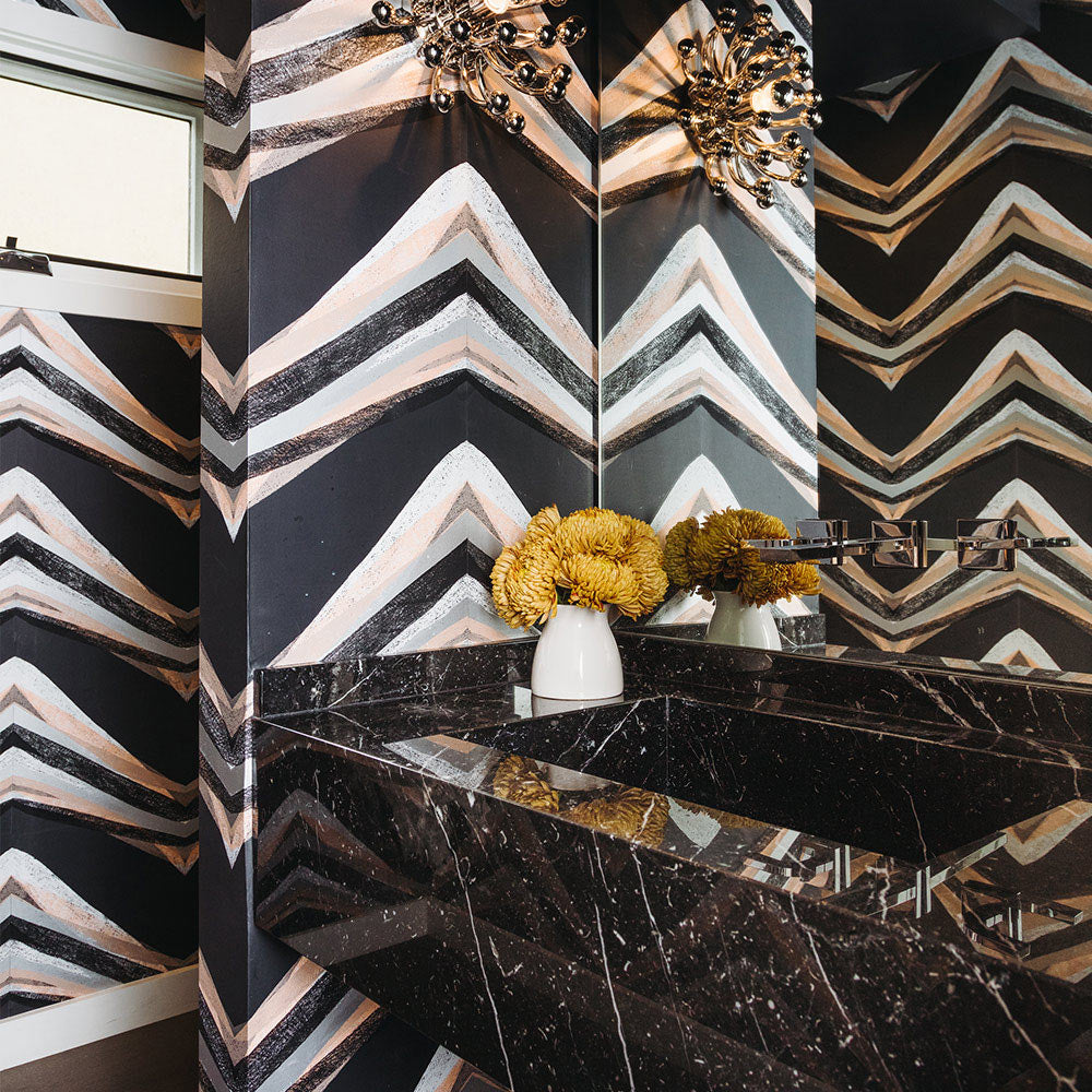 Yellow Flowers On A Dark Marble Sink