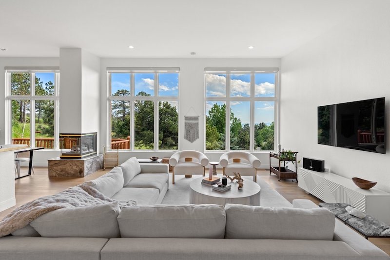 Wide Living Room In White Tones